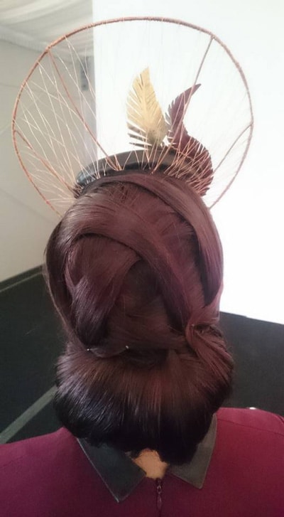 artistic hairstyle for race day