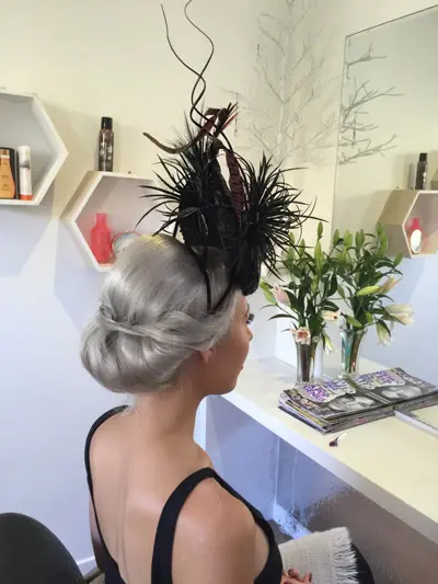 black spiky feathers reuse hat
