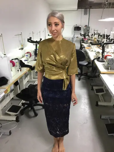 Milano wearing gold sequin top and Alice McCall skirt