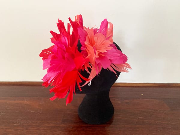 pink coral red feather headpiece