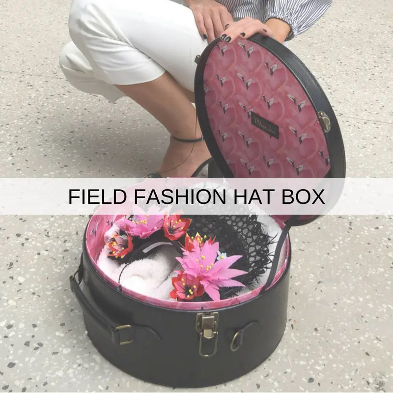 black round carry on hat box luggage suitcase