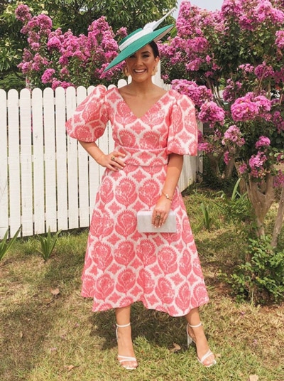 pink floral dress with green boater hat