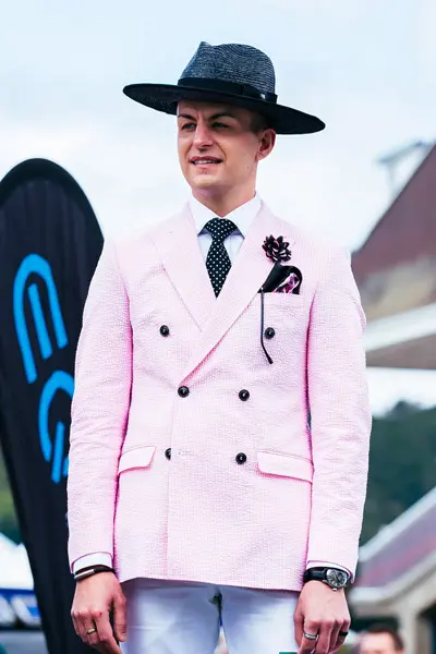 pink jacket black white polka dot tie mens fashions on the field